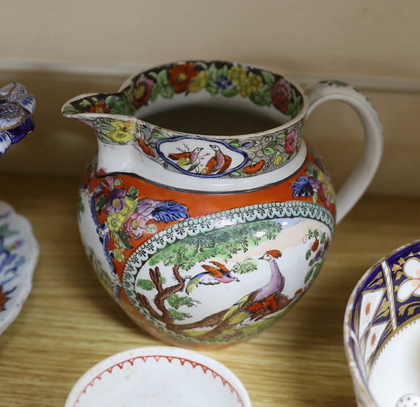 A pair of English ‘Japan Opaque’ china chestnut baskets and stands, c.1825, a Worcester 'dragons in compartments' saucer, Liverpool? coffee can a tea bowl, a pearlware jug etc.